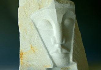 carved marble bust of an African king by Jean-Frederic Batasse