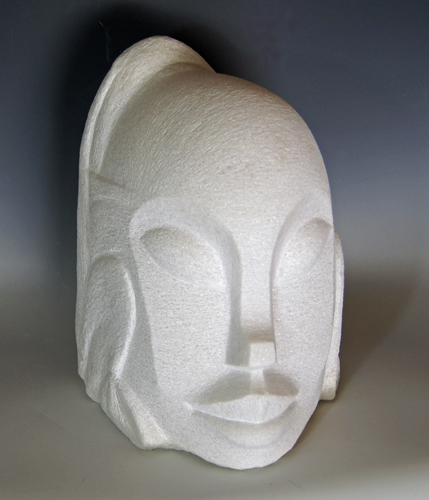 abstract carved marble head by Jean-Frederic Batasse