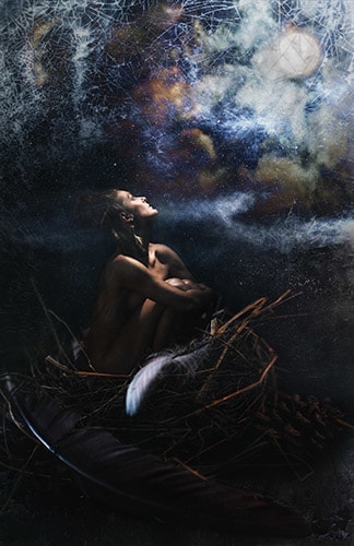 photo art of a woman in a nest by Jennifer Gleason
