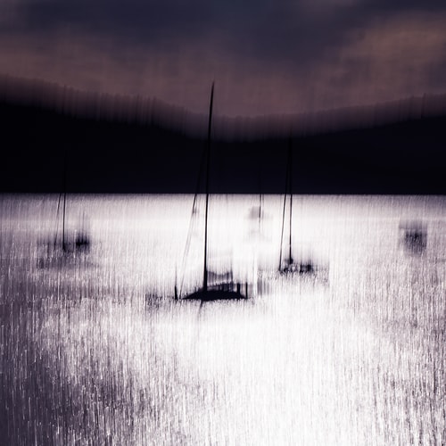 abstract photograph of an Australian harbor with anchored boats by Bruce Peebles