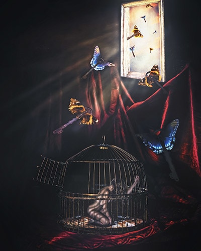 photo art of a caged woman representing Stockholm Syndrome by Jennifer Gleason