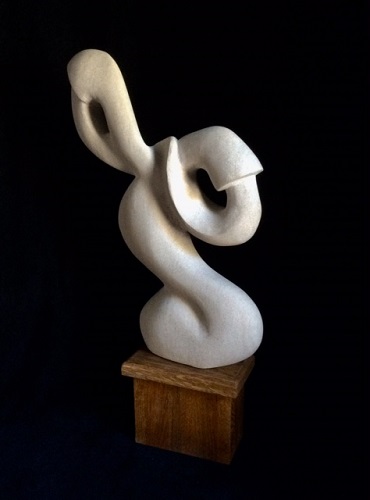 abstract wood and stone sculpture by William Kolok