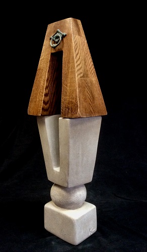 abstract wood and stone sculpture by William Kolok