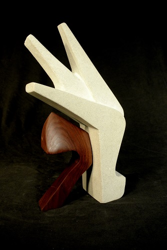 abstract wood and stone sculpture by William Kolok