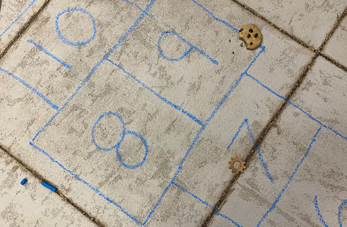 mixed media painting of a hopscotch board on concrete by Roberta Lynn Rose