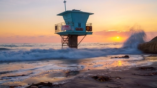 photograph of a guardhouse in the waves at Cardiff State Beach, San Diego, CA by Brian McClean
