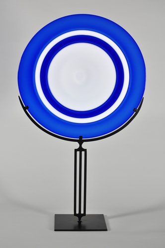 blue blown glass disc by Jake Pfeifer