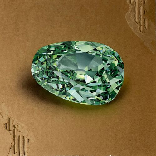 painting of a green gem on cardboard by Sherri Madison