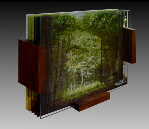 painted layered glass sculpture of a wooded scene by Michael Frank Peterson
