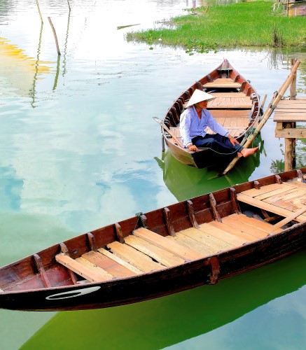 photograph of fishing boats in Hoi An by Jim Grossman