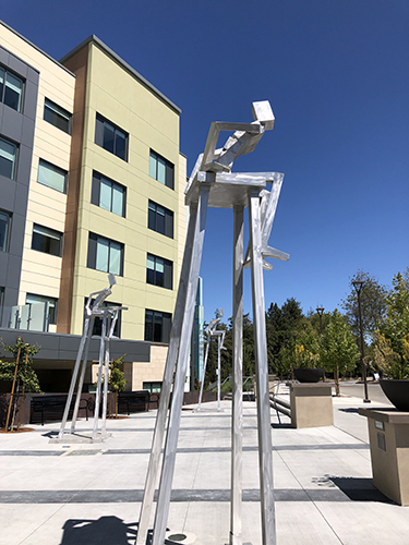 Large outdoor metal sculpture "Star Gazers" by James Moore