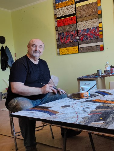 Artist Victor Cuzmenco in his studio