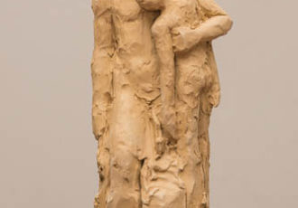 clay sculpture of a couple embracing by Paulina Cassimatis