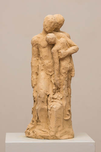 clay sculpture of figures embracing by Paulina Cassimatis