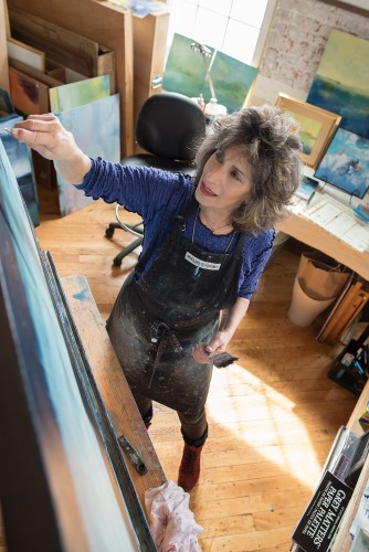 Artist Laura Radwell at work in her studio