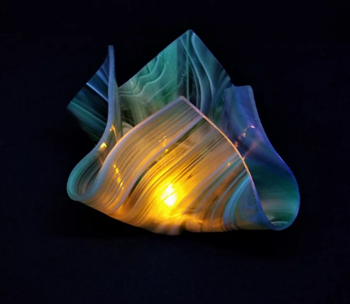 free form fused glass with light by Robbie MacIver