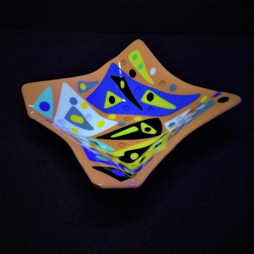 blue, yellow, black and brown fused glass plate by Robbie MacIver