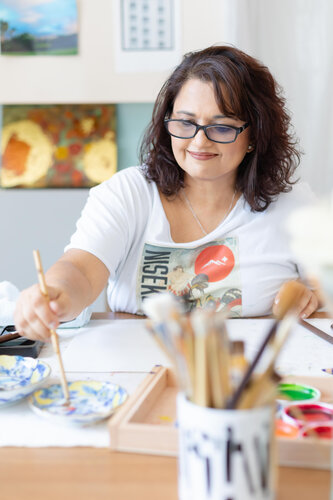 Artist Rajul Shah working in her studio