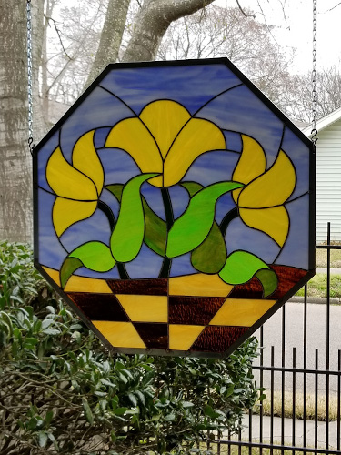 stained glass of a basket of tulips by Robbie MacIver