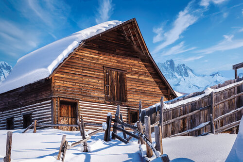 photograph of a cabin in winter by Beth Sheridan