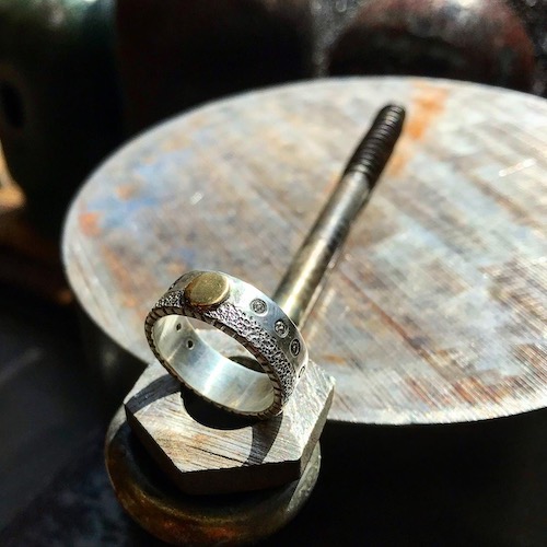 silver and gold ring by Tony Finocchio