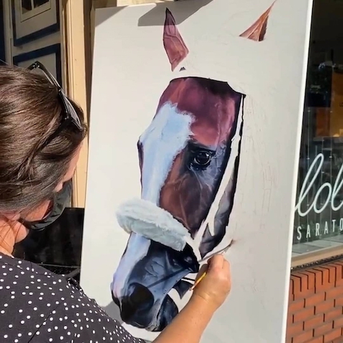 artist Jessica Leonard at work in front of Spa Fine Art