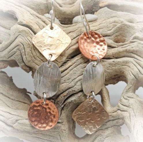 silver and copper earrings by Alene Geed