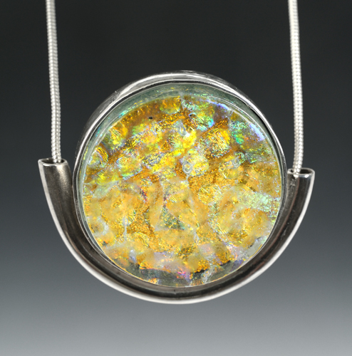 gold and silver pendant by Merrilee Harrigan