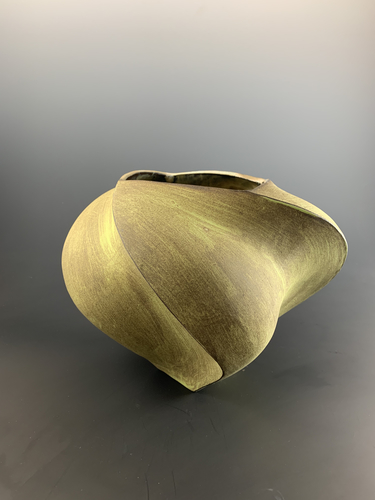 brown stoneware vessel by Peter Cunicelli