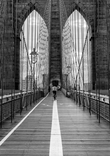 photography of a pedestrian bridge by Gary Washington