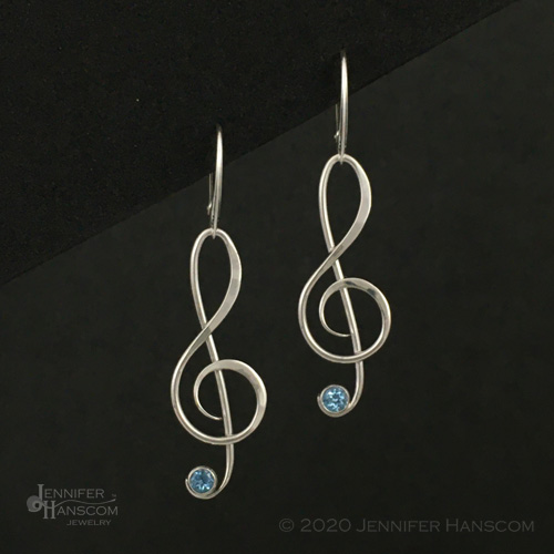 sterling silver and topaz G clef earrings by Jennifer Hanscom