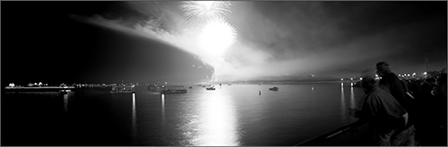 photo of fireworks over the water by Nubar Alexanian