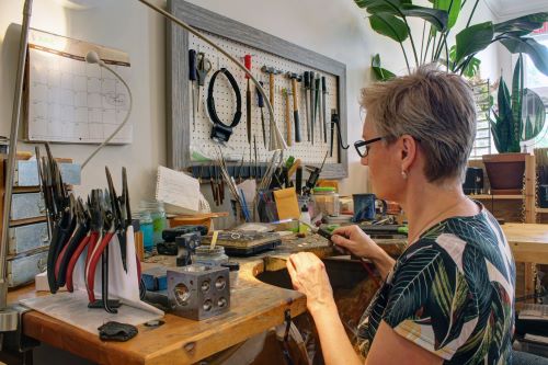 Artist Christiane Danna at the workbench