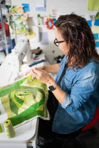 Artist Liberty Worth in her studio