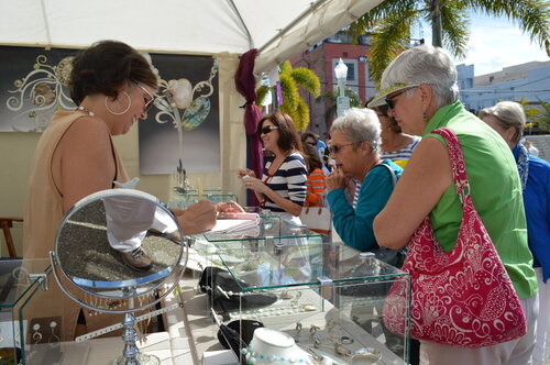Jewelry designer Barbara Umbel at her booth at ArtFest Fort Myers