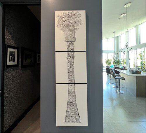 pen and ink drawing of a tree installed in office setting.