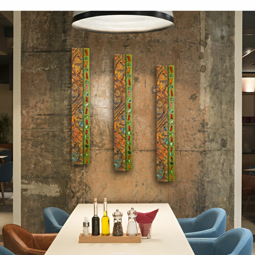 Triptych of wall sculpture in a room view