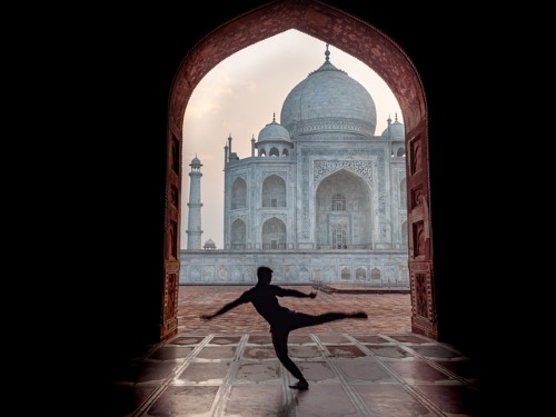 Photo of person dancing at the Taj Mahal