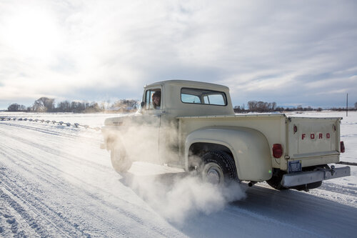 Driving away in a pickup truck