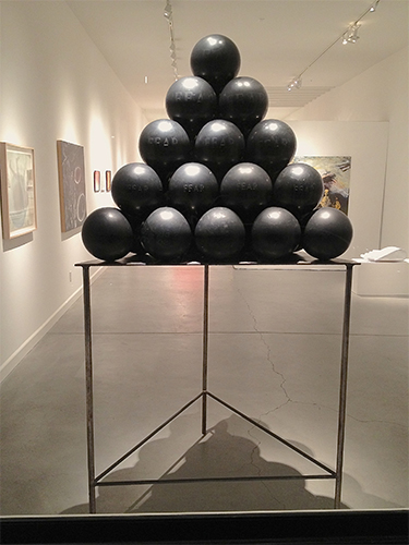 installation sculpture with bowling balls