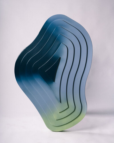 Abstract sculpture in lacquered wood