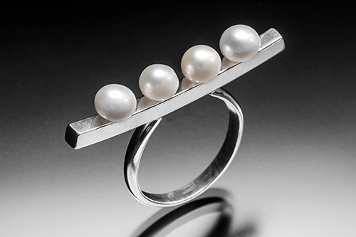 Sterling silver ring with pearls
