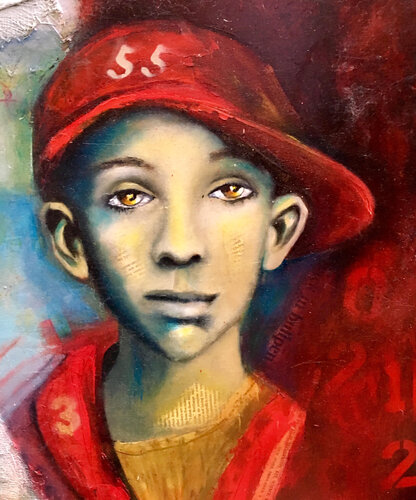 portrait of a boy in a baseball cap