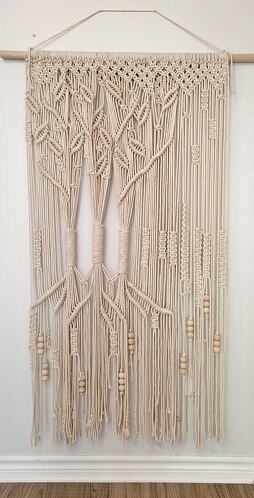 tree-themed macrame wall hanging