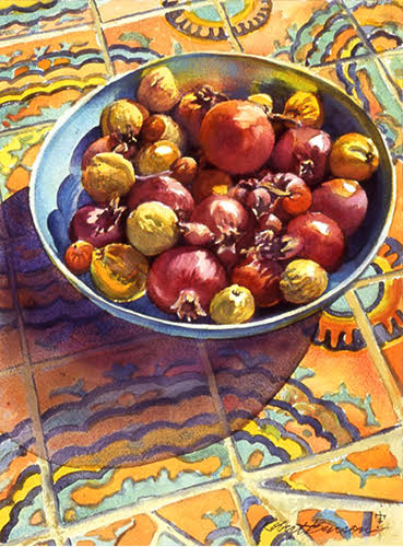 watercolor painting of a bowl of pomegranates