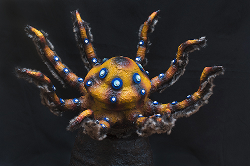 Spider sculpture from repurposed cardboard