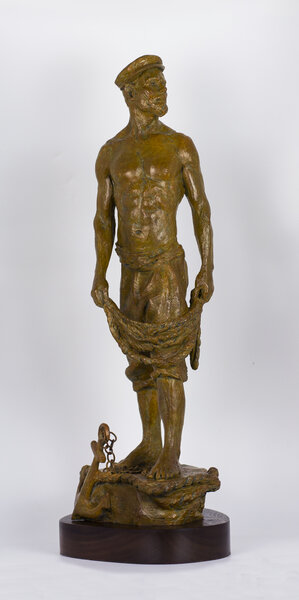 escultura de bronce de un pescador