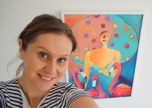 Artist Magda Betkowska with her painting