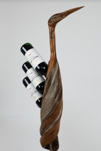 handmade wine rack in shape of a great blue heron