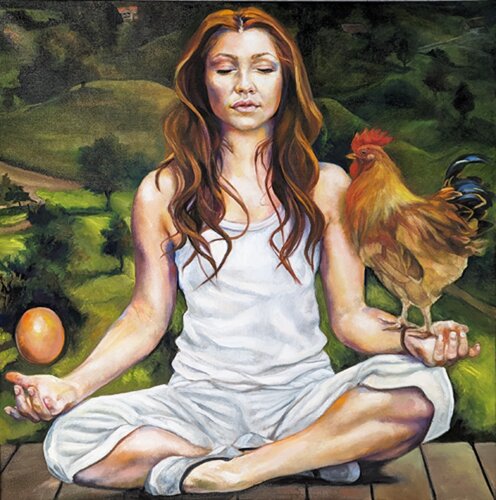 portrait of a woman with chicken and egg